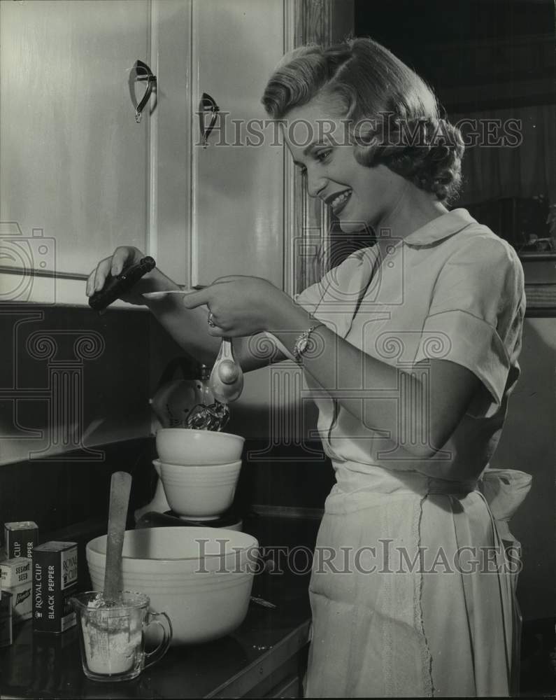 1959, Betty Lindstrom, Miss Alabama, cooking - abna43934 - Historic Images