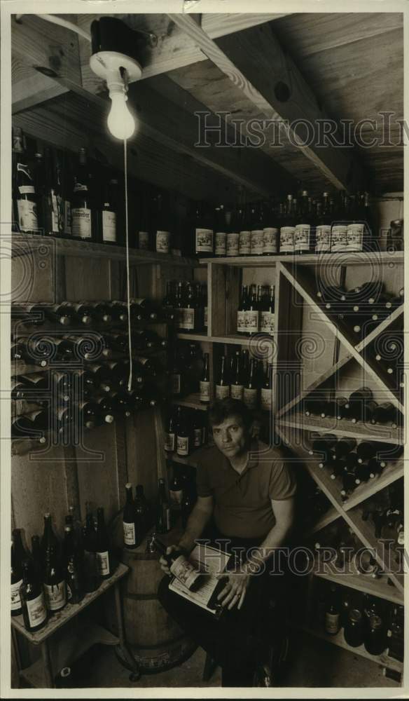 1987 Press Photo JSU professor with wine he made, Norman R. Dasinger - abna43938 - Historic Images