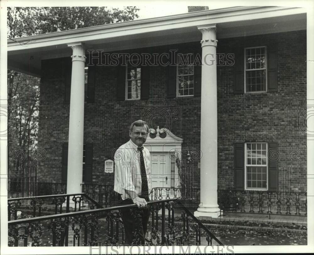 1992 Press Photo Frank Ryder Standing in Front of Brick Building - abna44127 - Historic Images