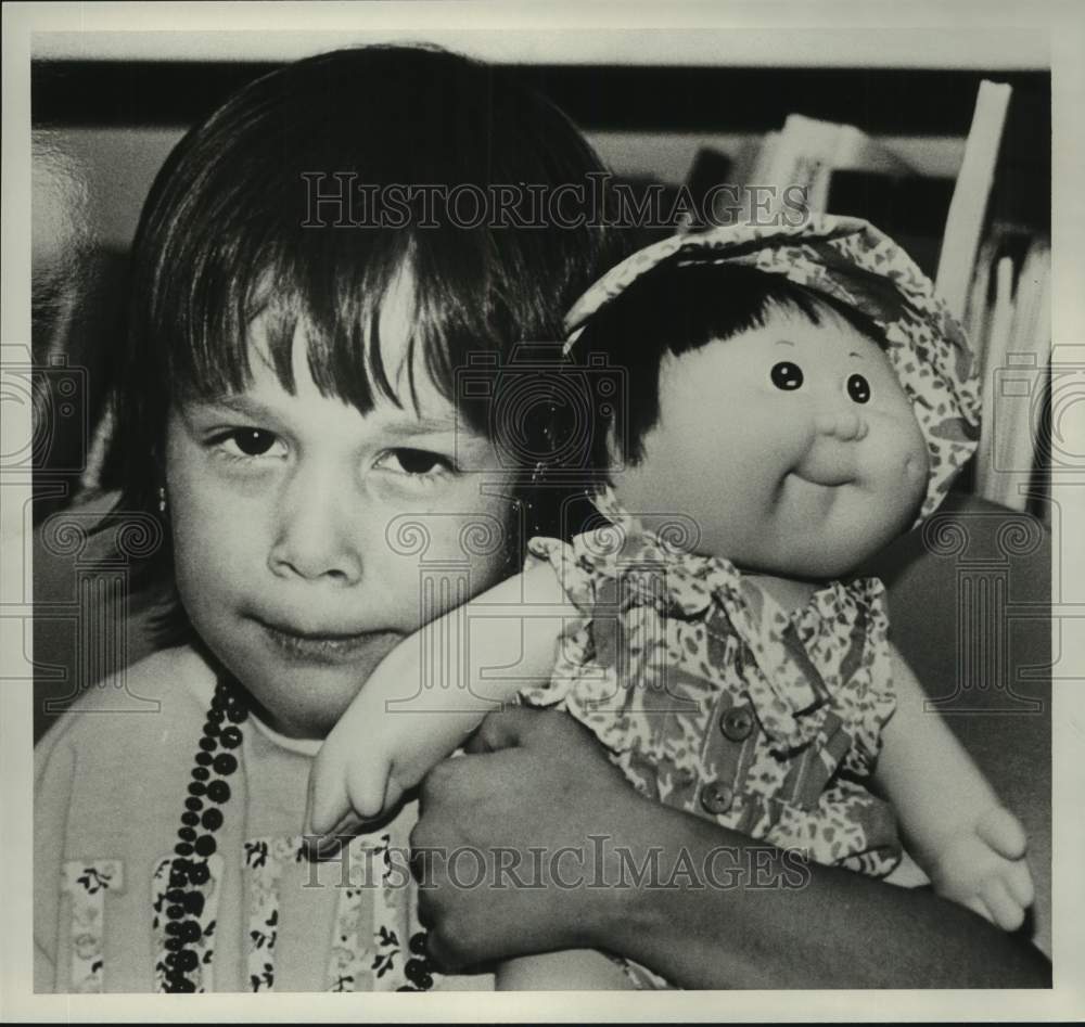 1991 Press Photo Child with cabbage patch doll - abna44326 - Historic Images