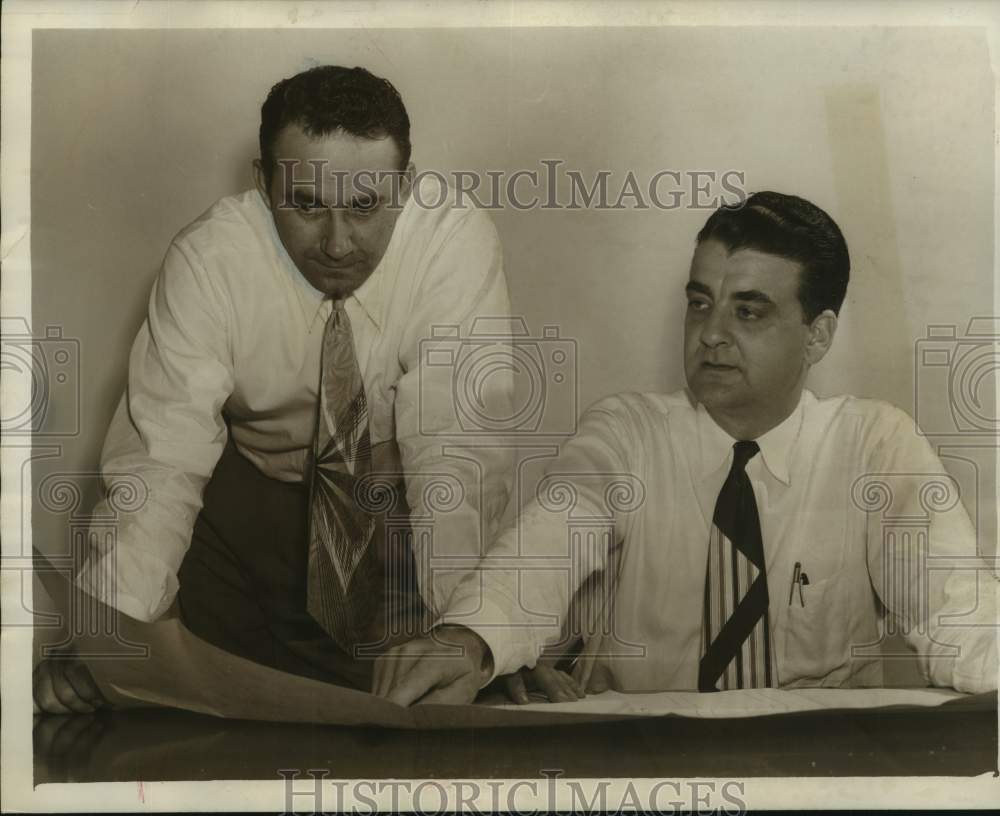 1951, Southern Bell Telephone Company Executives Look at Plans - Historic Images