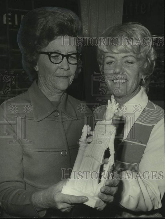 1973, Mrs. S.L. Howton, Mrs. Tommy Decker inspect statue - abna44533 - Historic Images