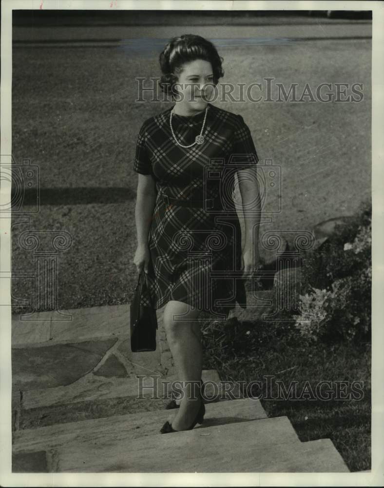 1969, Mrs. Rich Stockham walking up steps. - abna44574 - Historic Images