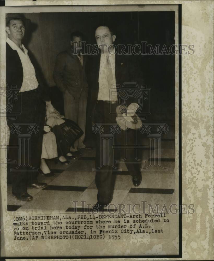 1955, Arch Ferrell walks to courtroom in Birmingham Alabama for trial - Historic Images