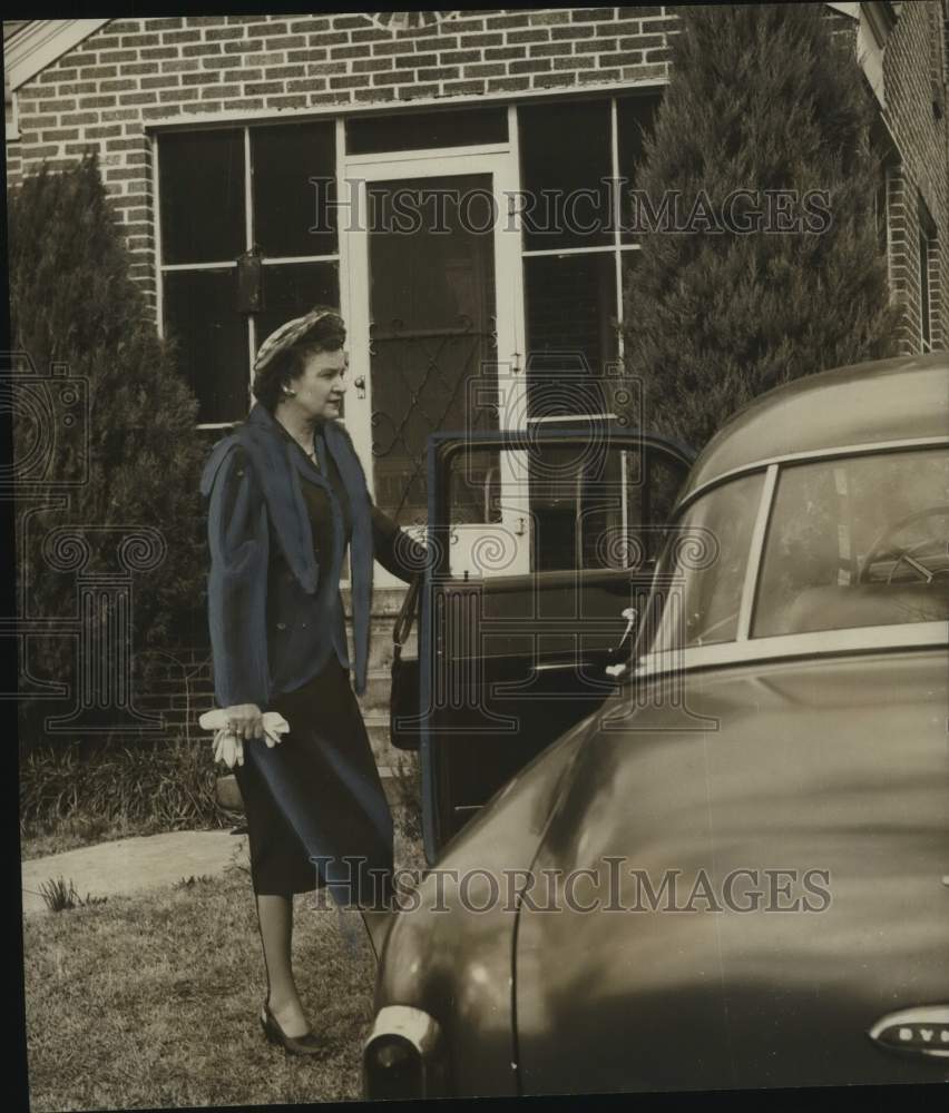 1953, Judge Annie Lola Price Prepares to Drive to Judicial Building - Historic Images