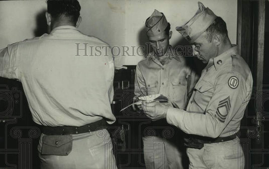 1954, National Guardsmen search circuit clerk's office in Phenix City - Historic Images