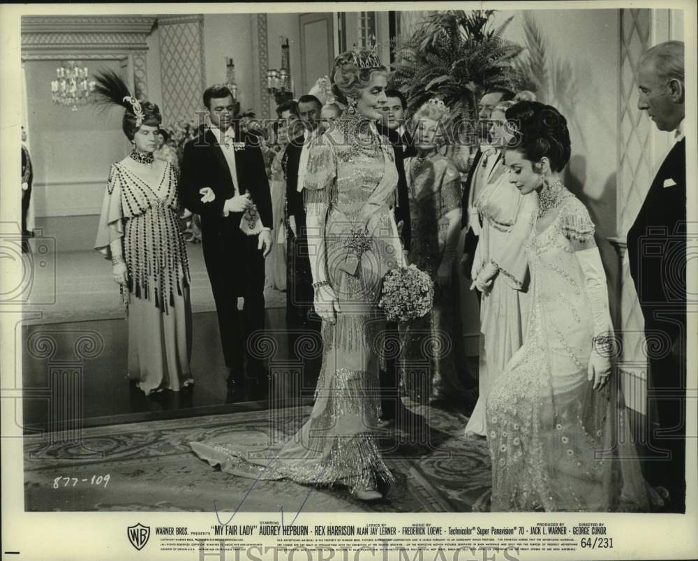 1965 Woman Curtseys in Scene from "My Fair Lady" - Historic Images