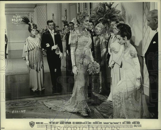 1965 Woman Curtseys in Scene from "My Fair Lady" - Historic Images