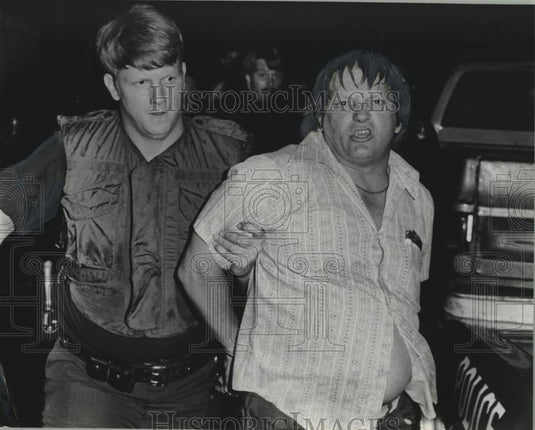 1979 Press Photo White Man Arrested in Kingston Taken Away by Police - abna46731 - Historic Images