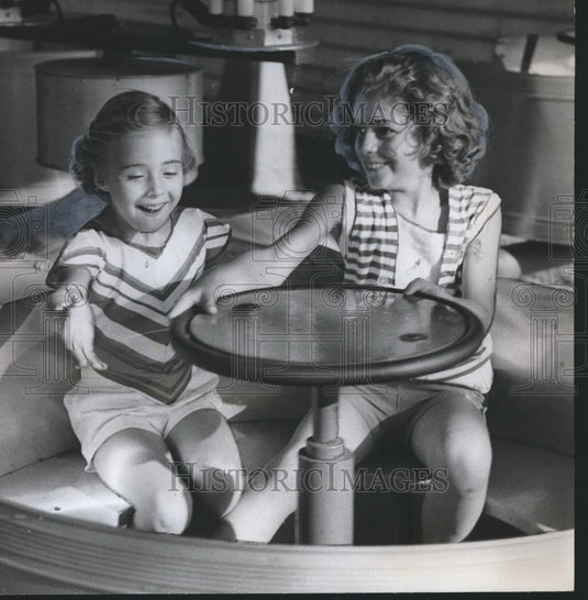 1961 Two Children on Tub Ride at Kiddieland in Birmingham, Alabama - Historic Images