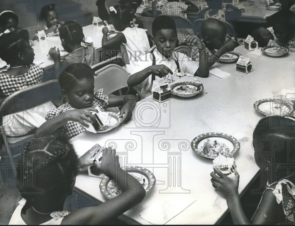 1965, Birmingham, Alabama Operation Head Start Children eating cake - Historic Images