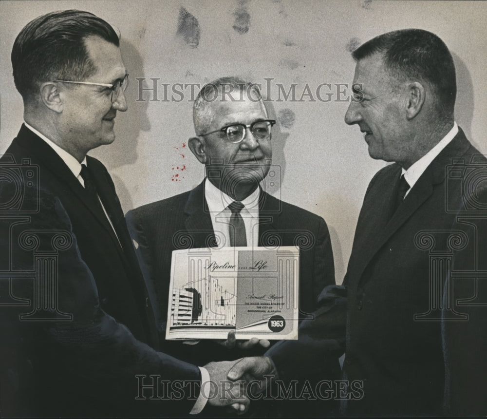 1964, Grady Fullerton congratulated by E. Reeves Sims, Tom Collins - Historic Images