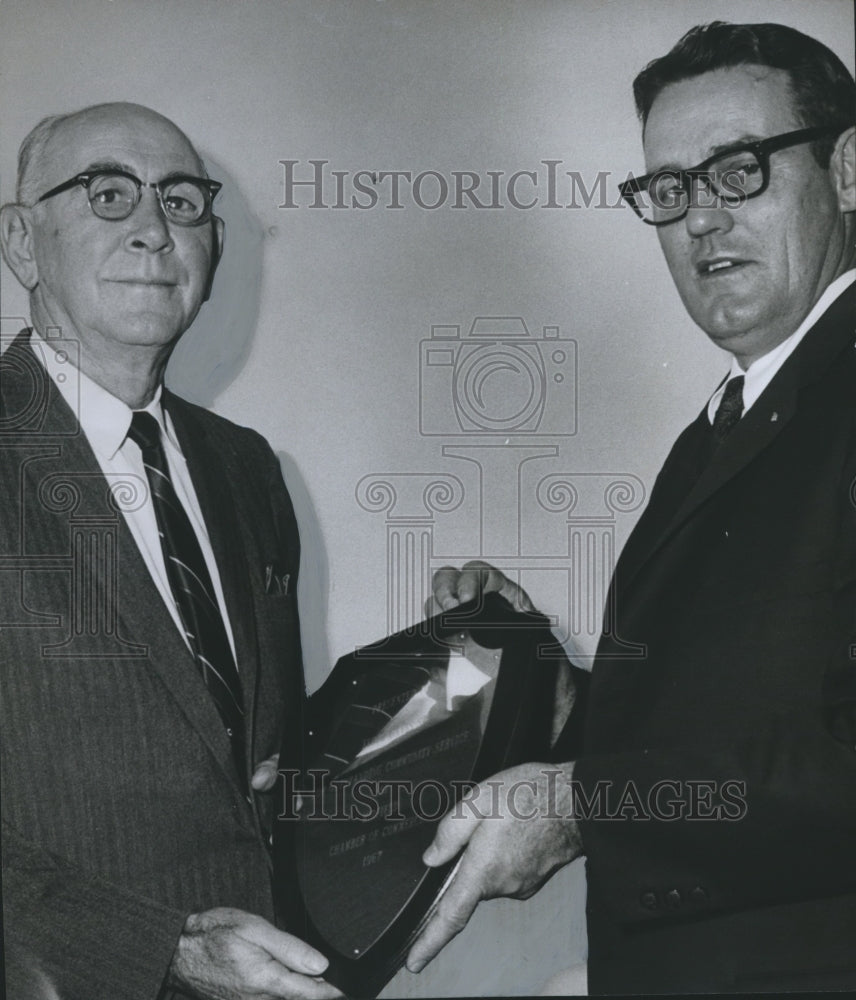 1968, Floyd Davis Sr., gets Man of the Year plaque from Tom Pate - Historic Images