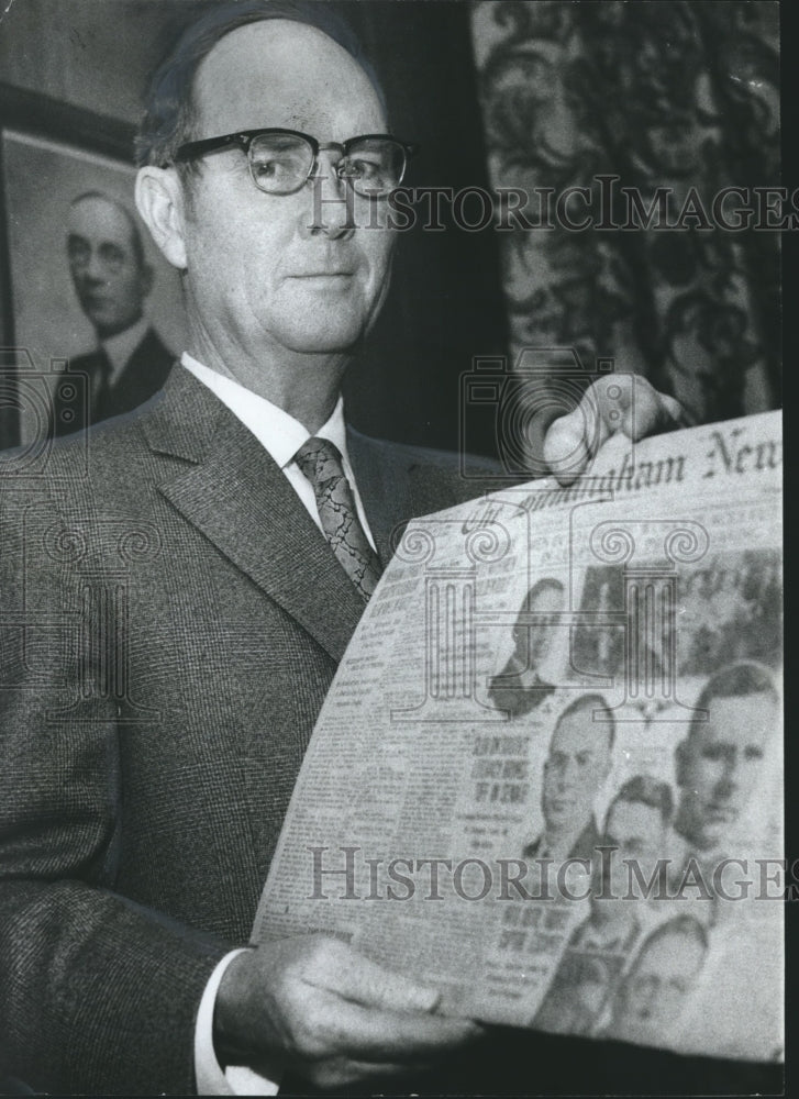 1969 Press Photo ACIPCO President Kenneth Daniel with copy of Newspaper - Historic Images
