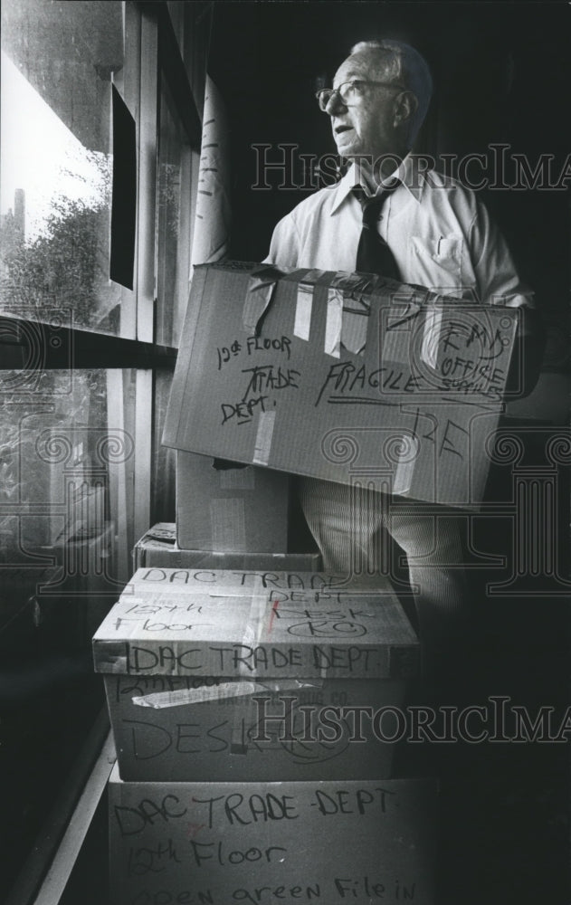 1978, Danny Danenberg of Chamber of Commerce, packs for Office Move - Historic Images