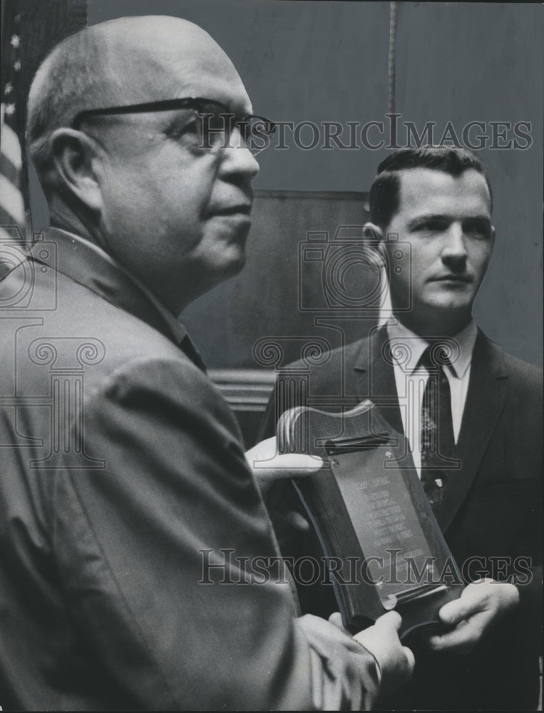 1967, Executive honored for bravery, Bryant Whitmire, Bob Edwards. - Historic Images