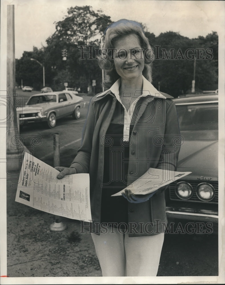 1974 Carolyn Crawford campaigns for House Seat in parking lot - Historic Images