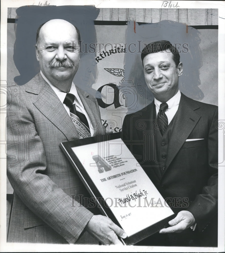 1977, Harold Blach Jr. receives award from The Arthritis Foundation - Historic Images