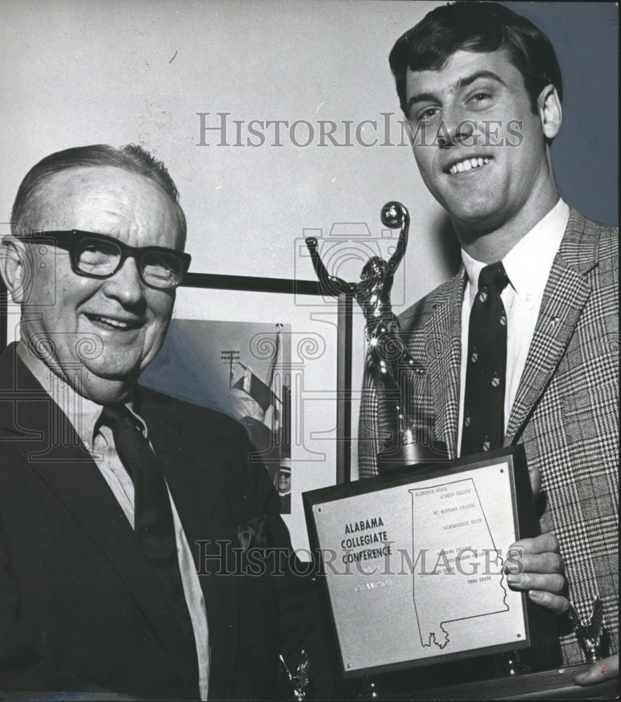 1969, Dr. Houston Cole, Educator presents award to student - Historic Images