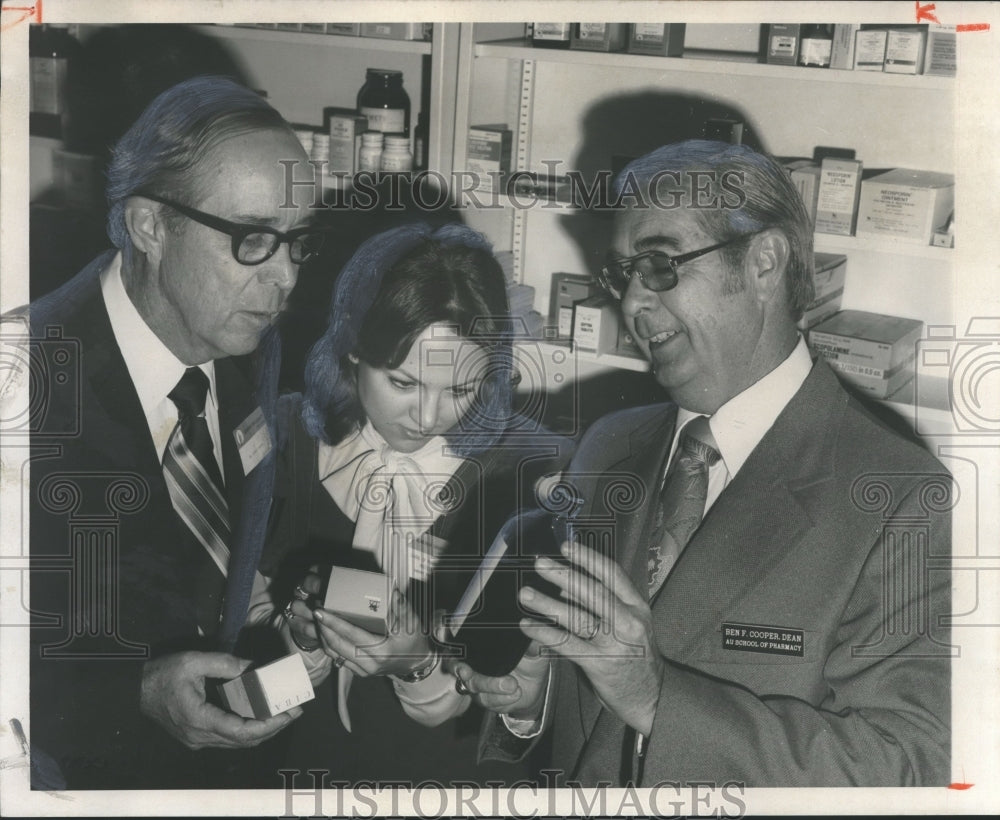 1976 Auburn Dean Ben Cooper and others in pharmacy - Historic Images