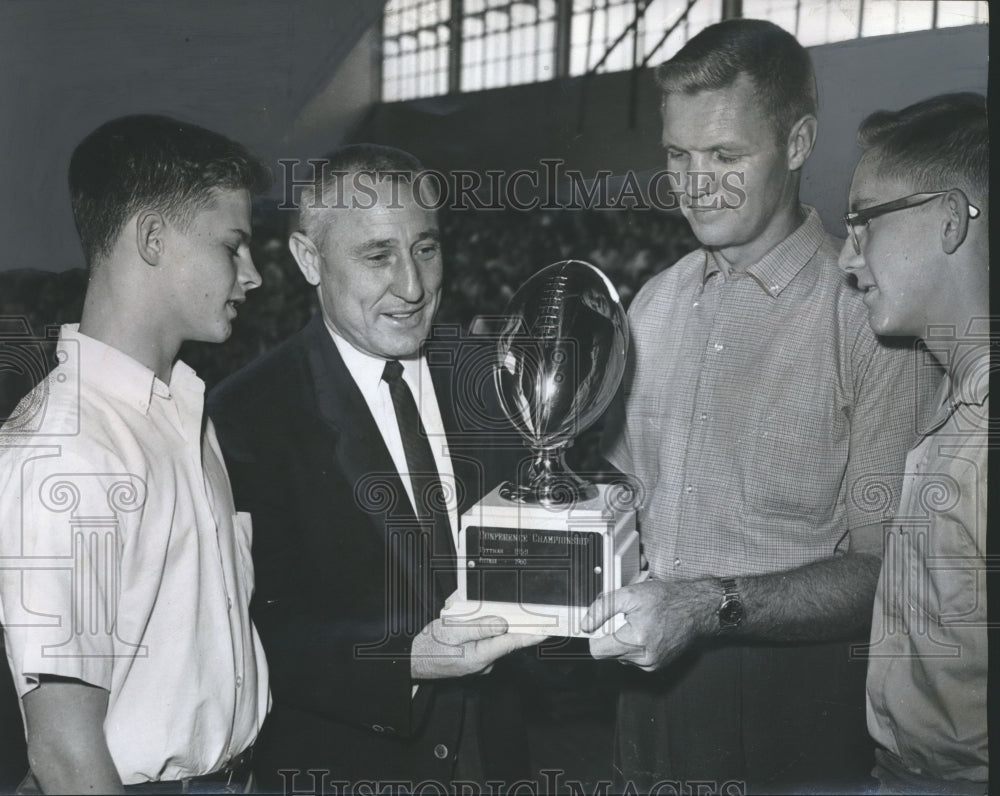 1961 Press Photo Principal Carl Cooper and students with football trophy - Historic Images