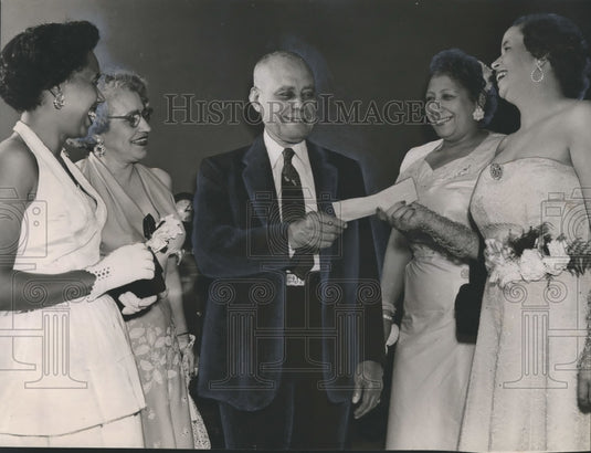1954, President of Miles College Doctor W. A. Bell receives Check - Historic Images