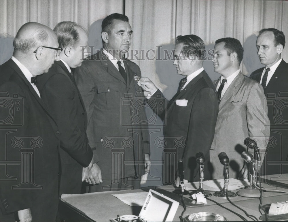 1963, Gen. Reid Doster gets medal from Alabama Gov. George Wallace - Historic Images