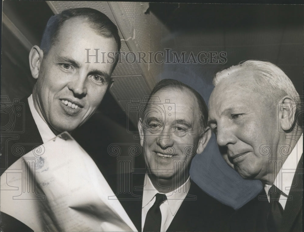 1963 Press Photo Banker sJohn Hall and Frank Plummer review report - abno02139 - Historic Images