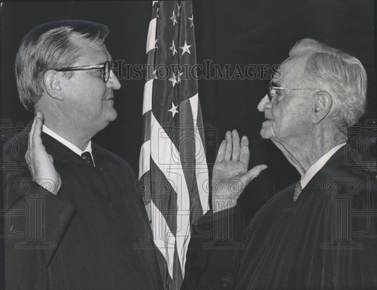 1975 Eric Embry sworn in as state judge by father Judge Frank Embry - Historic Images