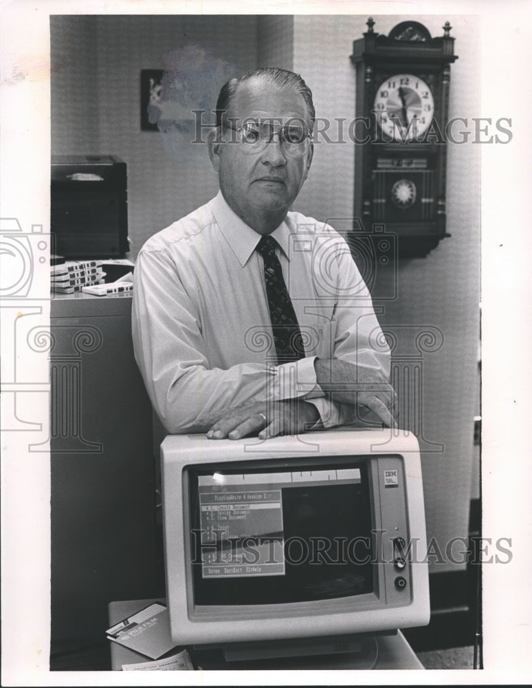 1991, Mel Cooper Stands Above Computer - abno02270 - Historic Images