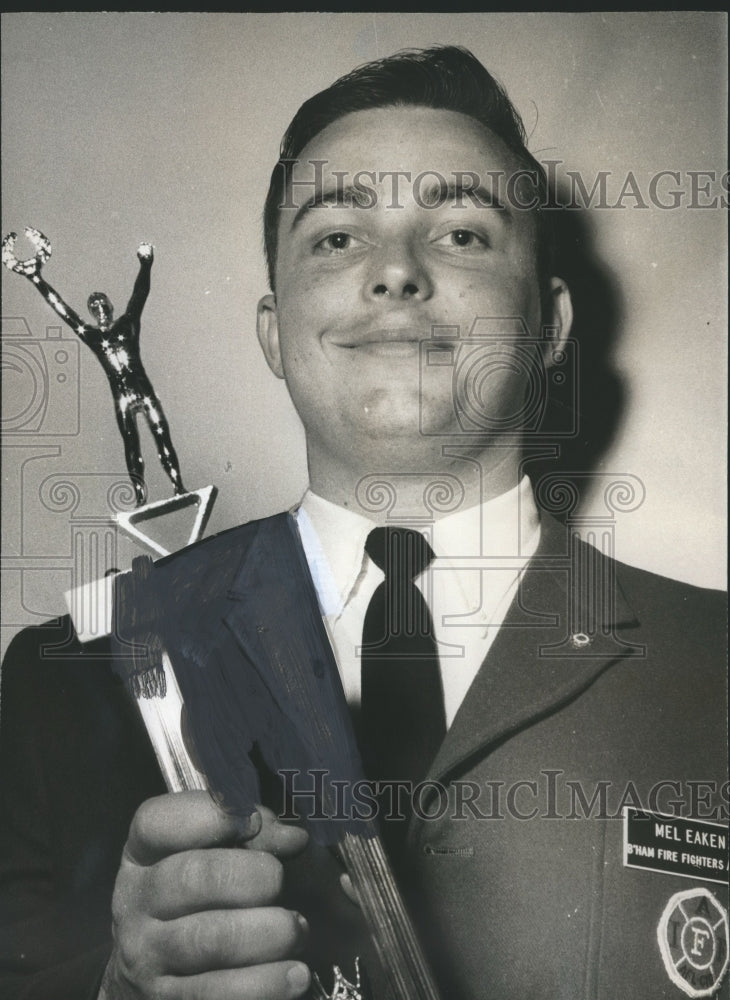 1970 Press Photo Birmingham Fire fighter Mel Eaken with trophy - abno02373 - Historic Images