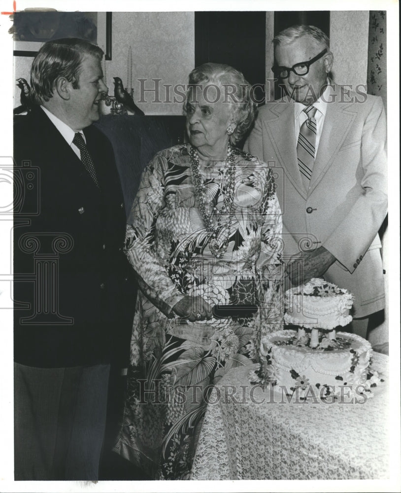 1980, Toasting Mrs. Mary Ellen Ebersole on her birthday were sons - Historic Images