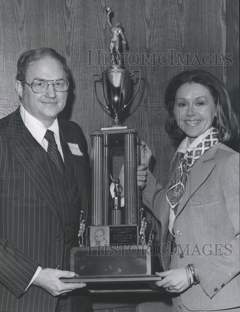 1978, Dominick trophy for NAIA winner, Larry Striplin with Treasurer - Historic Images