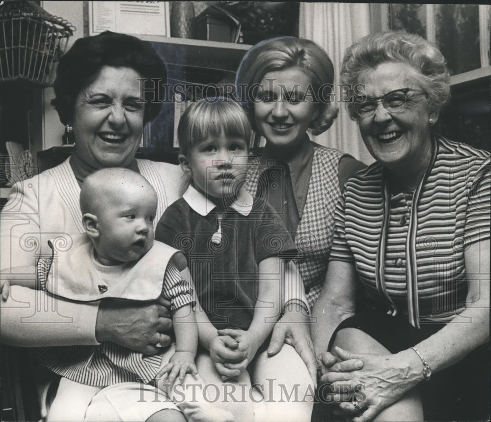 1971, Mrs. Dan Waite, bank president, posing with her family, Centre - Historic Images