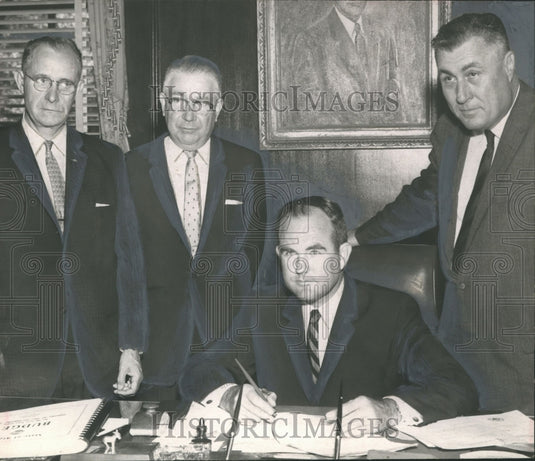 1961, Alabama Governor John Patterson with Albert Boutwell at desk - Historic Images