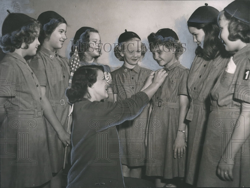 1952, Members of Brownie Troop Number 160 receive Brownie pins - Historic Images