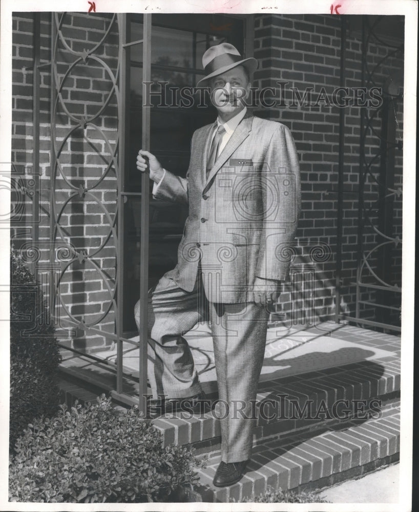 1957, Engineer James W. Goodwin posing on steps - abno03546 - Historic Images