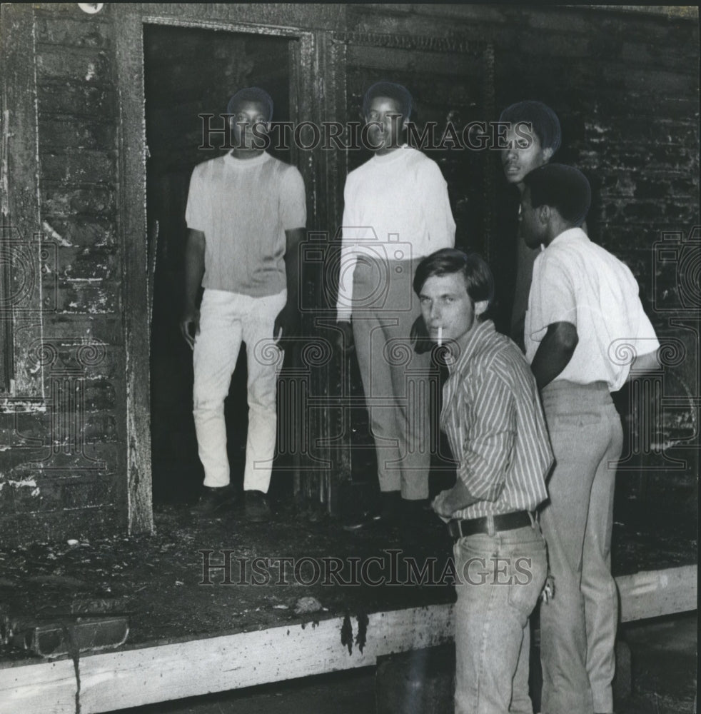 1970, Men inspect home in aftermath of fire in Birmingham, Alabama - Historic Images