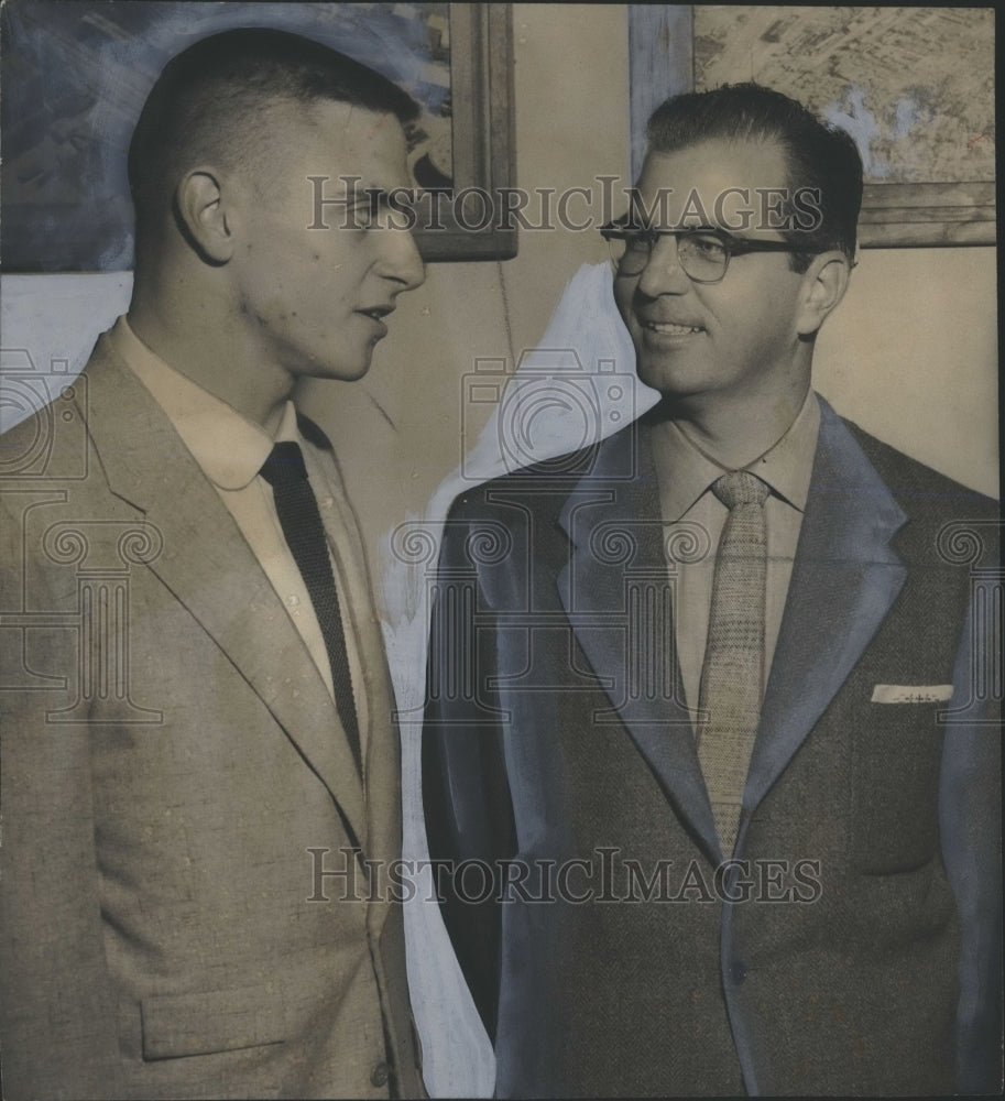 1956, Charles Waide Talks with Pastor Woodfin Grove at Team Banquet - Historic Images