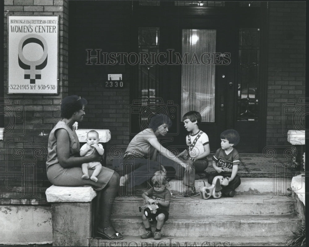 1980 Children and adults on the steps of the Women&#39;s Center, Alabama - Historic Images