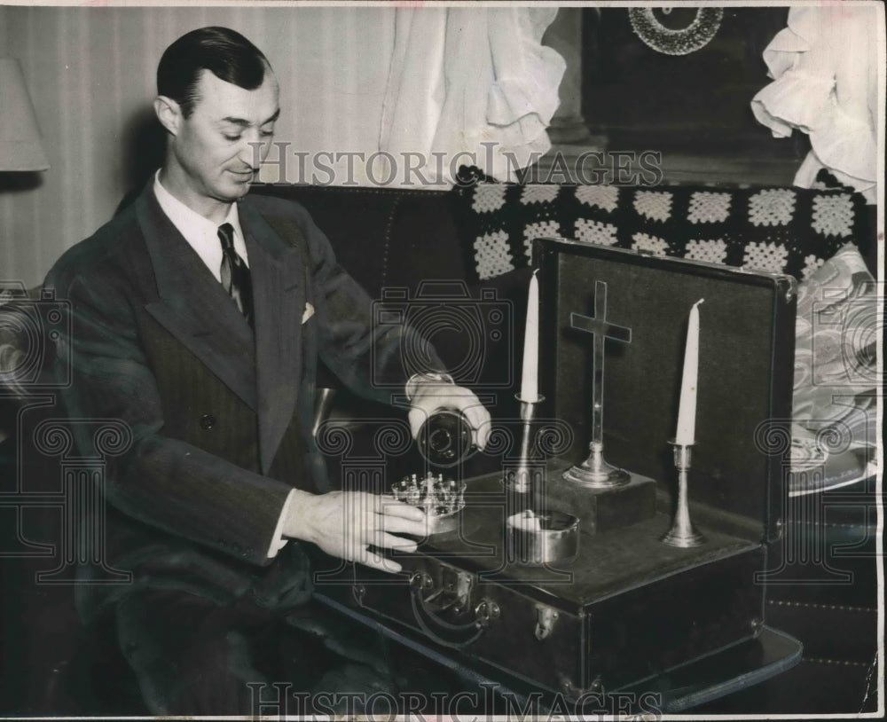 1948 Press Photo Reverend John Troxler with religious items - abno04333 - Historic Images