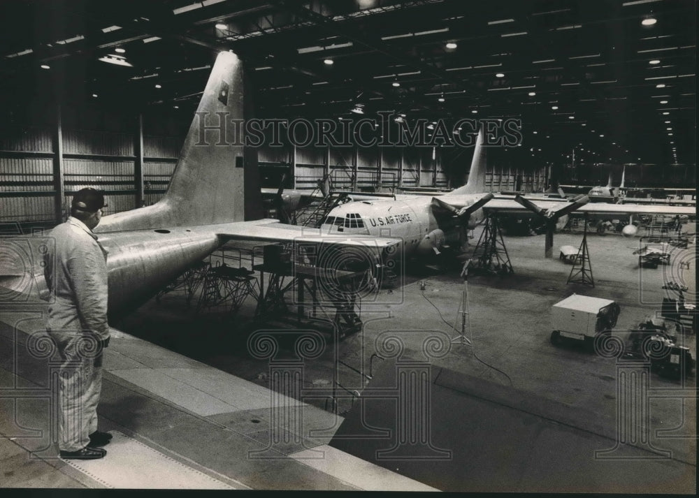 1984, Planes in hangar at Hayes Aircraft Company, Birmingham, Alabama - Historic Images