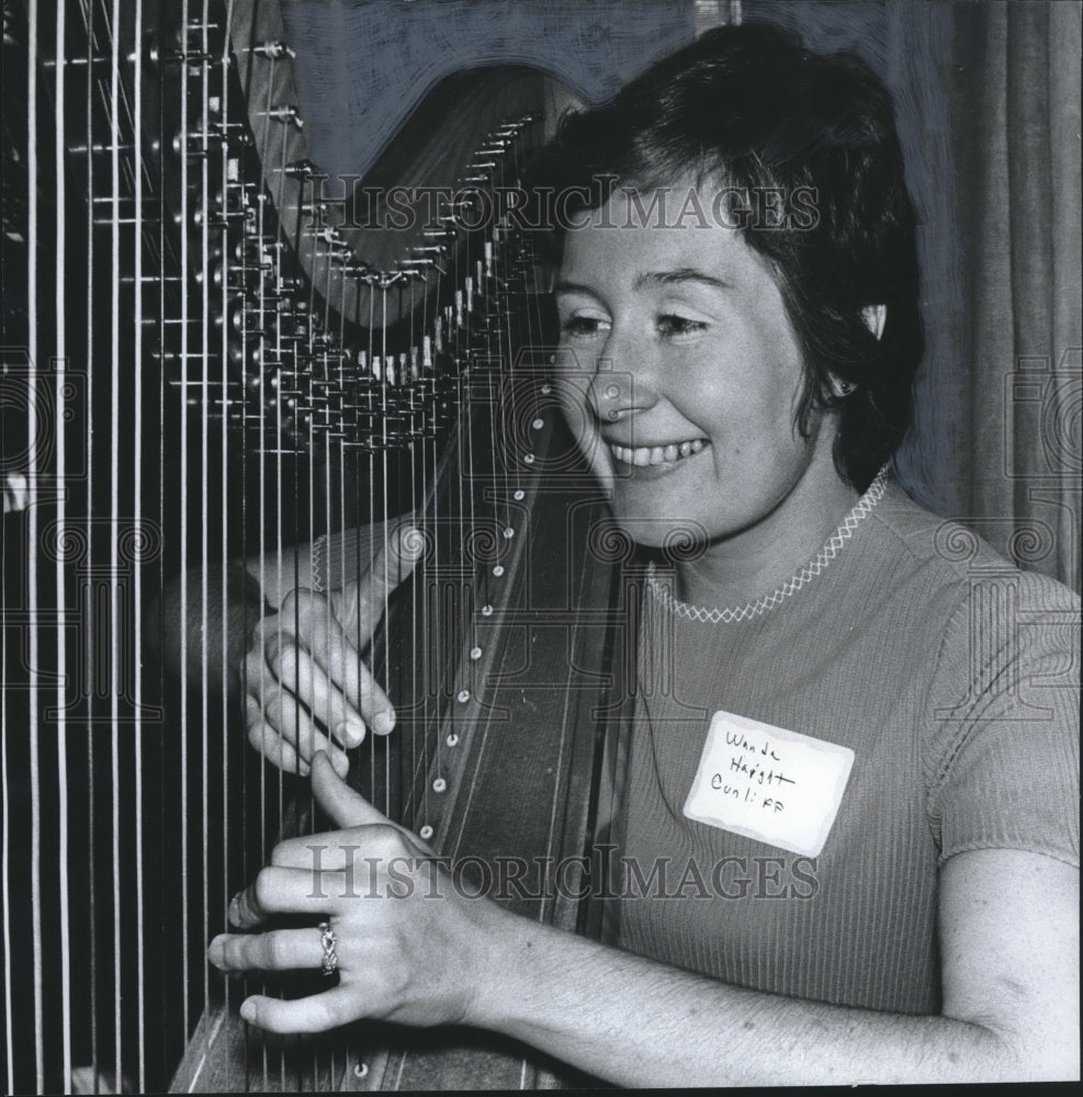 1974, Birmingham Symphony harpist Wanda Cunliff plays harp - Historic Images