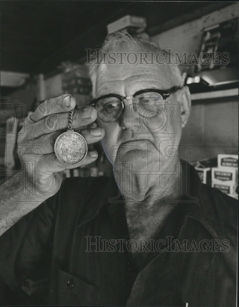 1981 Cullman Store Owner J. J. Knight won't part with silver dollar - Historic Images