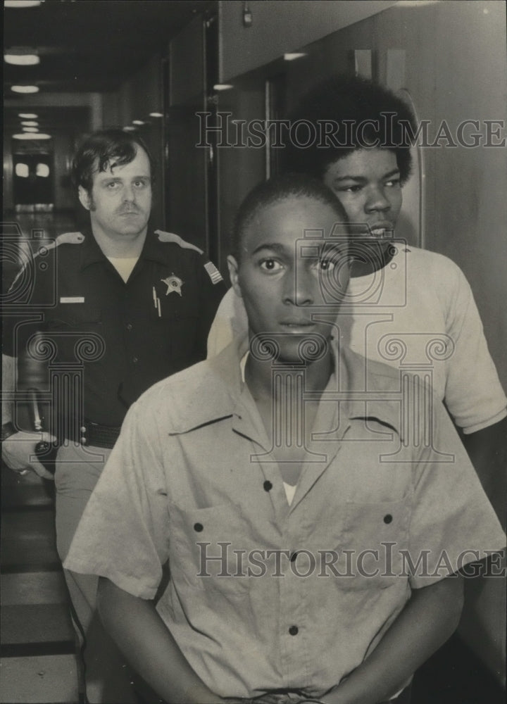 1976, Defendants Jett and Brown, charged with murder on way to court - Historic Images