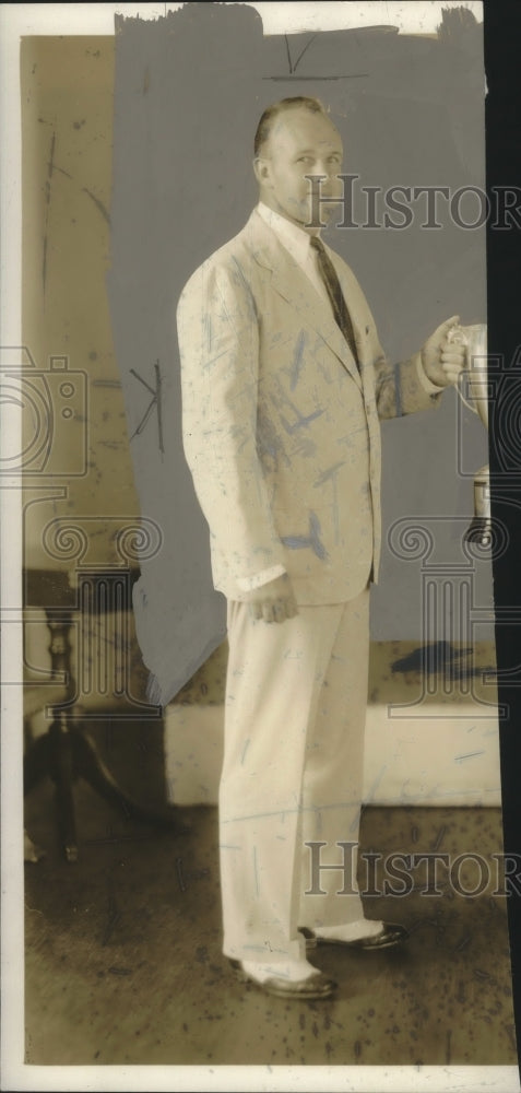 1941, Arthur C. Crowder Junior holds tropy - abno05404 - Historic Images