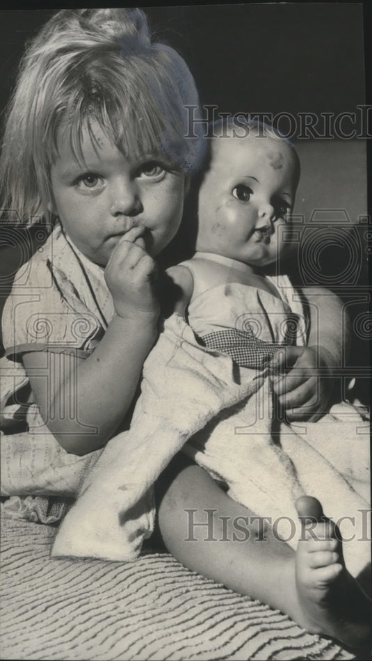 1961, Little Girl Holds Doll - Jefferson County Food Distribution - Historic Images
