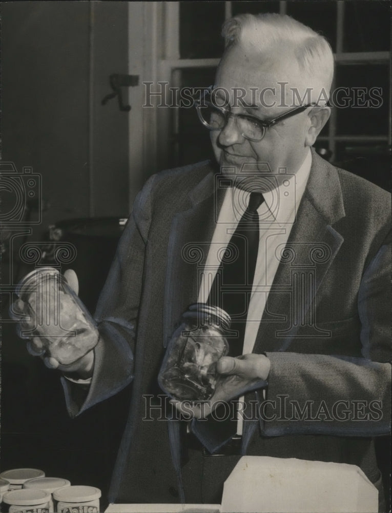 1960, Lamar Mims Ware, Auburn Professor, Holding Jars - abno05618 - Historic Images