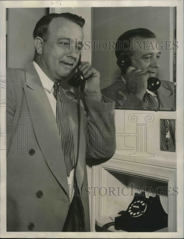 1948, Reverend Frank Johnson on the phone - abno05743 - Historic Images