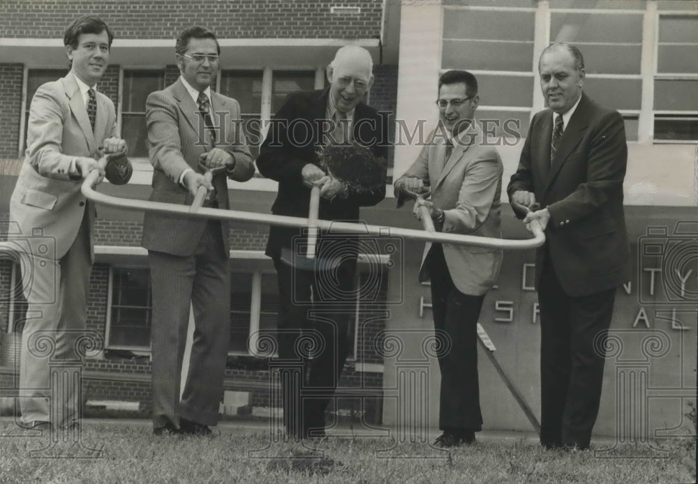 1973, Mayor Jim Haygood &amp; Others Begin Digging for Hospital Addition - Historic Images